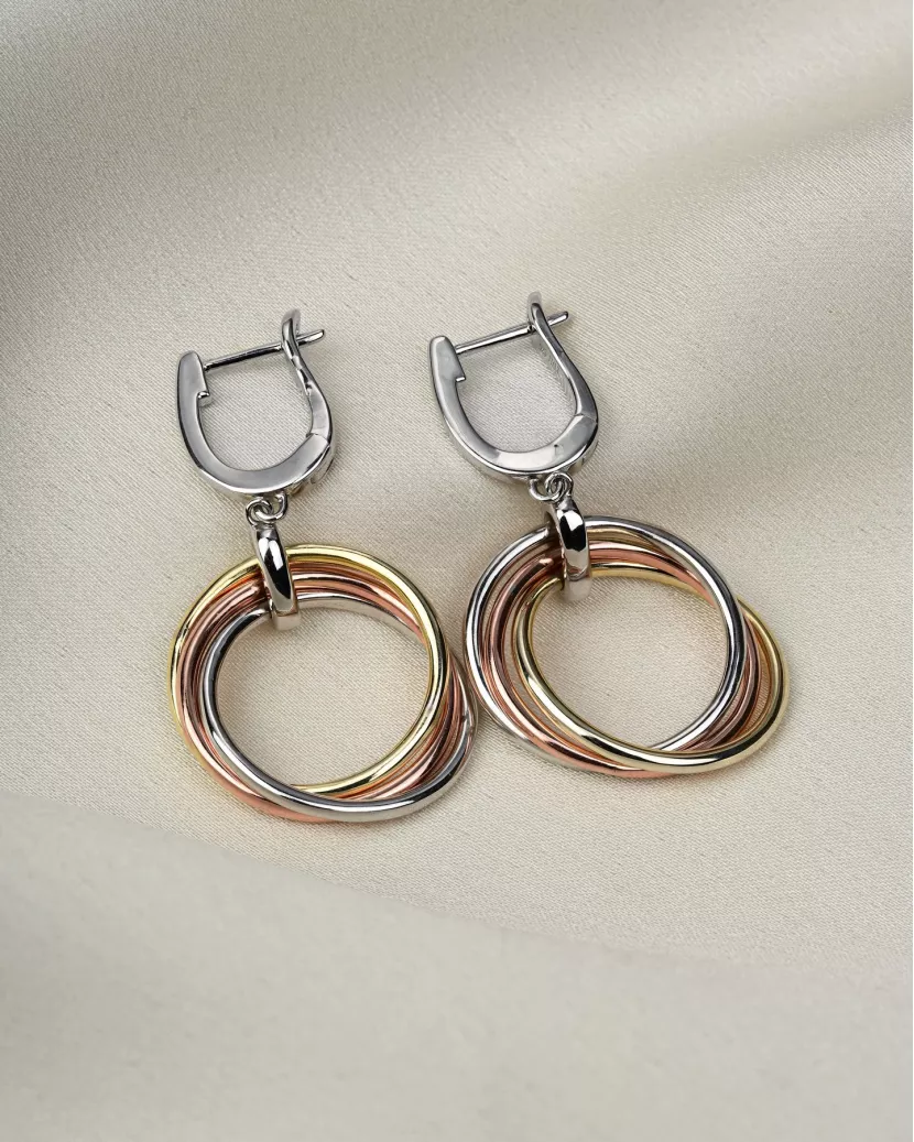 Сережки срібні висячі Три кільця в позолоті 007065