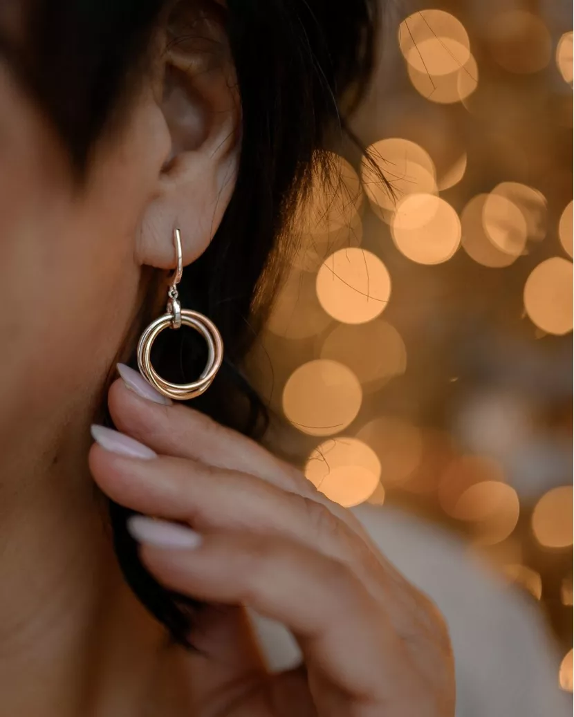 Сережки срібні висячі Три кільця в позолоті 007065