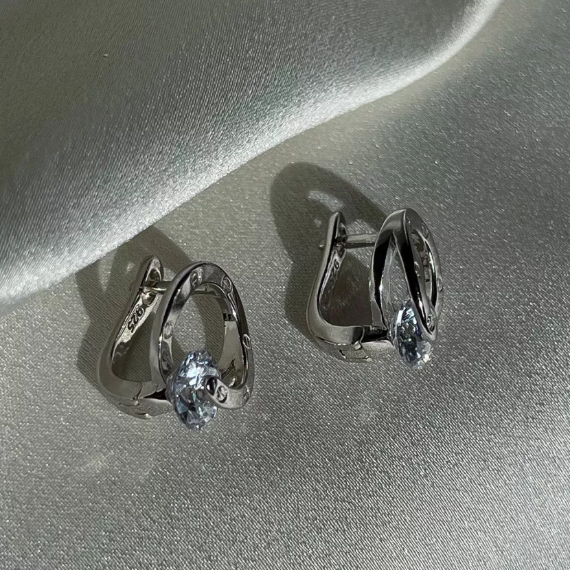 Серьги серебряные круглые с вращающимся камнем