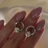 Серьги серебряные круглые с вращающимся камнем