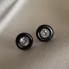 Сережки - пусети (гвоздики) срібні з чорною керамікою і цирконієм діамантового огранювання 003367
