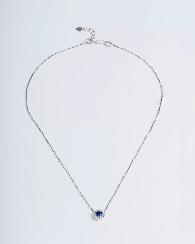 Срібне кольє з підвісом із синього цирконію діамантової огранки і розсипом по колу 006610
