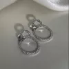 Серьги - джекеты серебряные Мерцающие круги