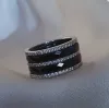 Каблучка срібна з чорною керамікою і цирконієм діамантової огранки 000673