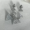 Серьги - джекеты серебряные Сияющие треугольники