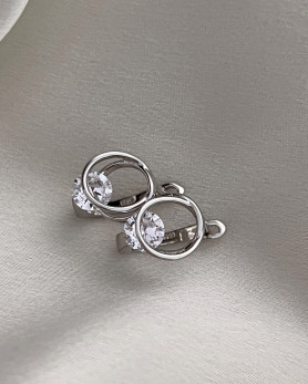 Серьги серебряные с вращающимся цирконием бриллиантовой огранки