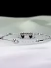 Кольцо серебряное "Сердца" с черной эмалью и цирконием бриллиантовой огранки