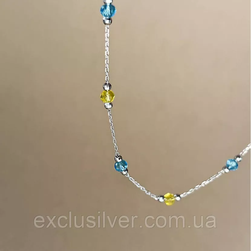 Срібний ланцюжок-кольє із жовто-блакитним кришталем 006340