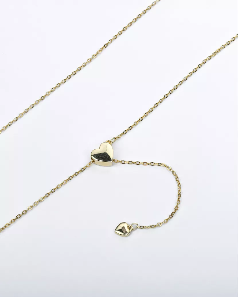 Срібне кольє-краватка із сердечком, що рухається у позолоті 007045